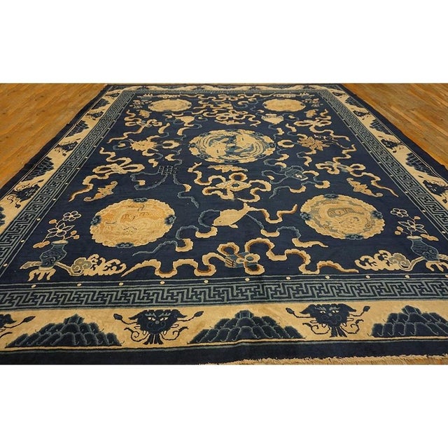 Antique Chinese - Peking Chinese Floral, Medallion Blue 1880s Rug, Circa Date: 1880s. This exceptional late Qing Dynasty...