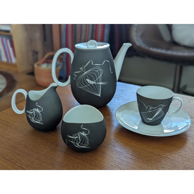 This is a rare and striking Johann Haviland Bavaria "Papageno"porcelain tea set, featuring a bold modernist matte charcoal...