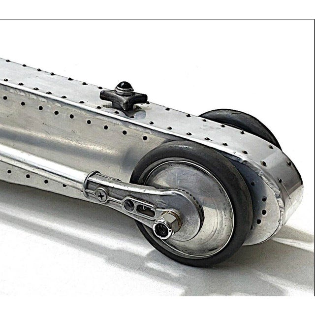 An extraordinary architectural large scale streamlined futuristic aircraft-aluminum sculpture by contemporary artist Baron...