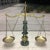 Japanese green marble and bronze reminiscent of a Solomonic column topped with an eagle balance beam is supporting two...