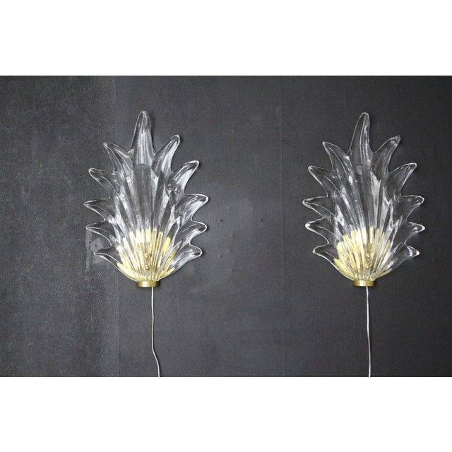 This beautiful leaf shaped Murano glass was entirely hand made in Italy.Its shape is remarkable, as if it was meant to...