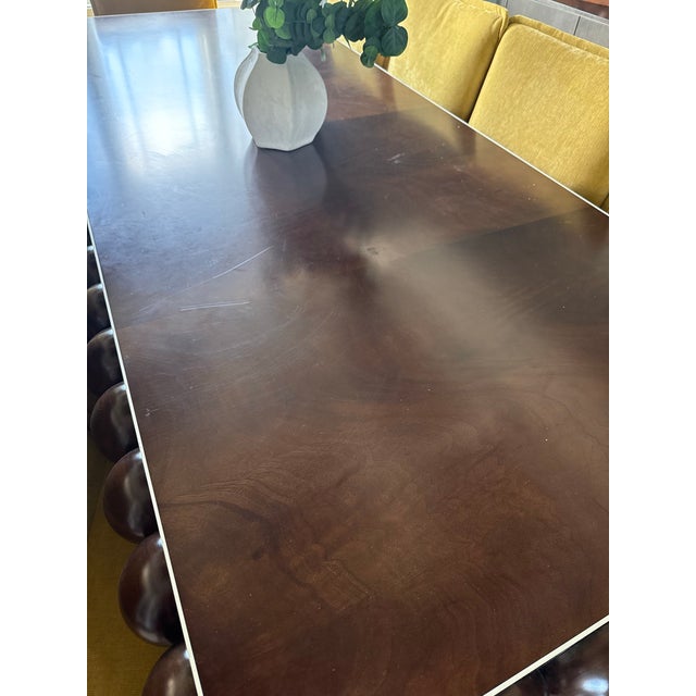 Bring timeless craftsmanship and elegance into your dining space with this stunning Jonathan Charles Orb Dining Table....