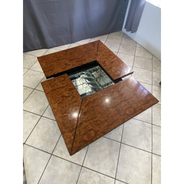 Beautiful coffee table/bar with a sliding elm burl top that opens thanks to an ingenious mechanism, revealing a lovely bar...