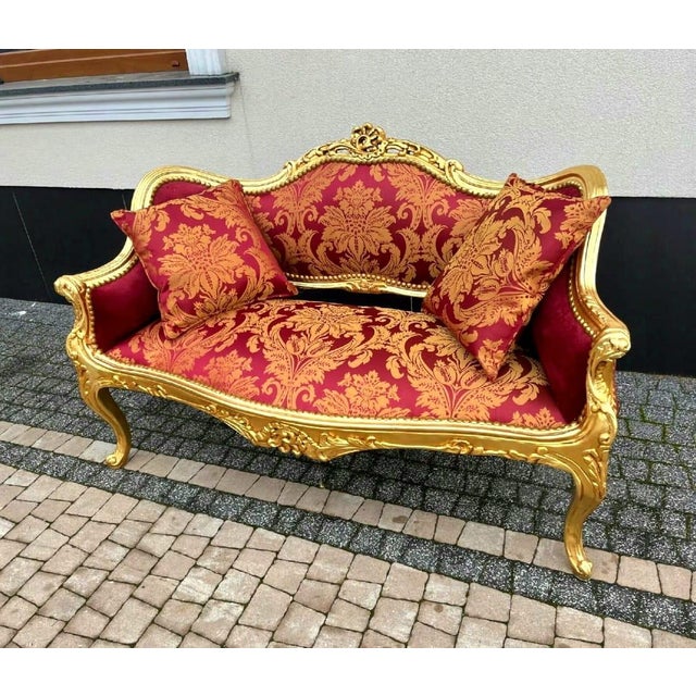 This vintage French Baroque style tufted settee is a dramatic statement piece designed to bring richness, romance, and...