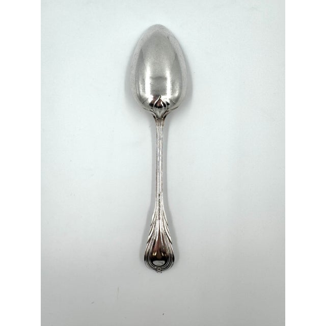 This is a dinner spoon by Elkington & Co. Elkington & Co was established in 1830 until 1842- Elkington & Company...