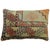 Pillow made from a mid-20th century Turkish rug with zipper closer and a poly-fill insert Measures: 16" x 24'.