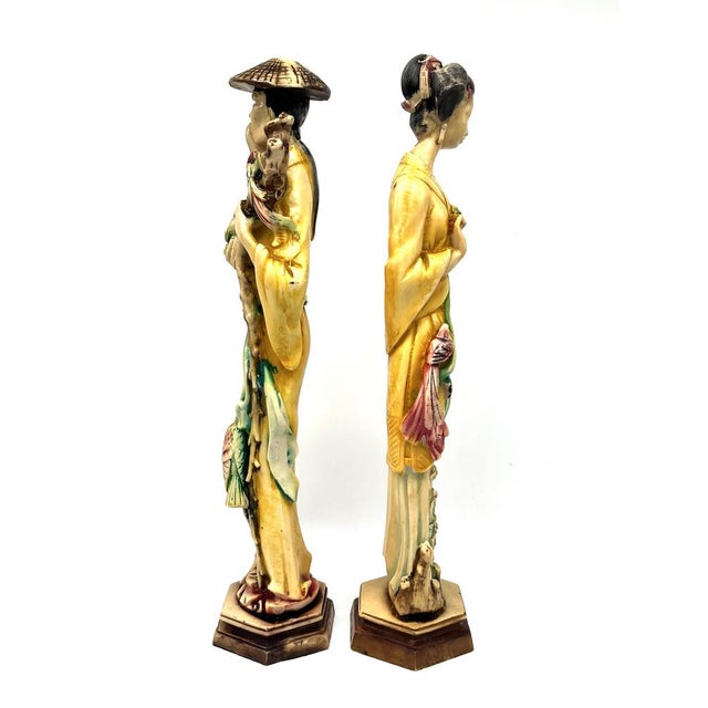 This stunning pair of large-scale vintage sculptures perfectly captures the aesthetic of classic 1970s Hollywood Regency...