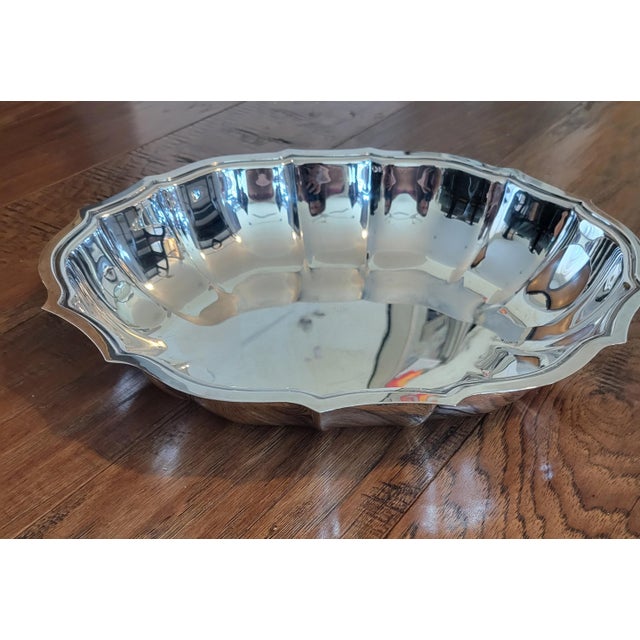 Classic Chippendale seving pieces add something special to any occasion. Bowl measures 12 1/4" by 10" by 2". Tray is 10...