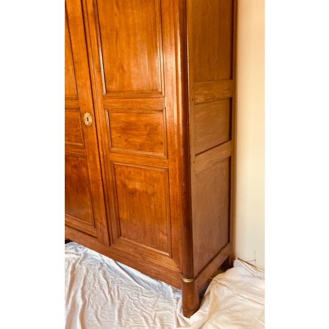 Antique French Empire Armoire Walnut, Columns to Either Side Front With Bronze Gilt Mounts Also Gilt Bronze Key Hole For Sale - Image 9 of 12