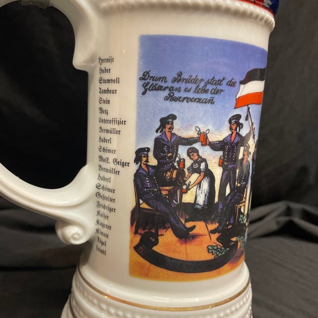 A fine military commemortative German beer stein with elaborately-decorated, pewter lid. Found at the upscale St. Louis...