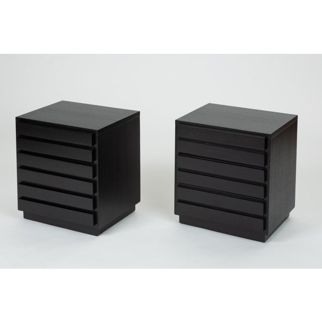 A pair of nightstands from Virginia-based manufacturer, American of Martinsville from the 1950s. The boxy storage pieces...