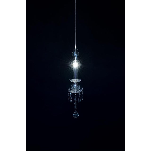 Spectrum modular pendant light in polished chrome and cut glass by aggiolight. Dimensions: d 12 x h 44 cm. Materials:...