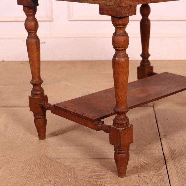 Late 19th C oak luggage stand. 1880 Dimensions:W: 61cm (24")H: 51cm (20.1")D: 45.5cm (17.9") This piece is designed in the...