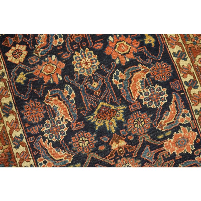 Antique Bakshaish Hallway Runner Wool Blue Rug, Circa Date: 1900s. This exquisite example of Persian weaving tradition...