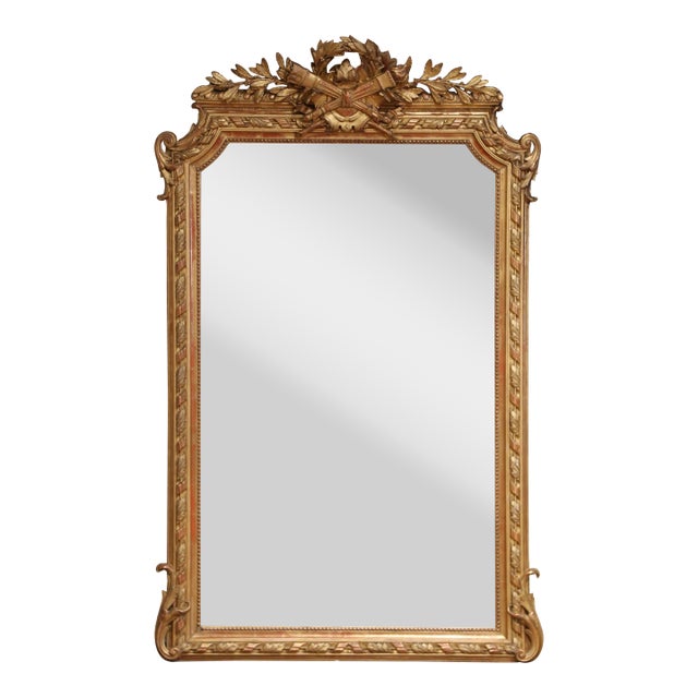 19th Century French Louis XVI Giltwood Wall Mirror With Laurel and Ribbon Crest For Sale