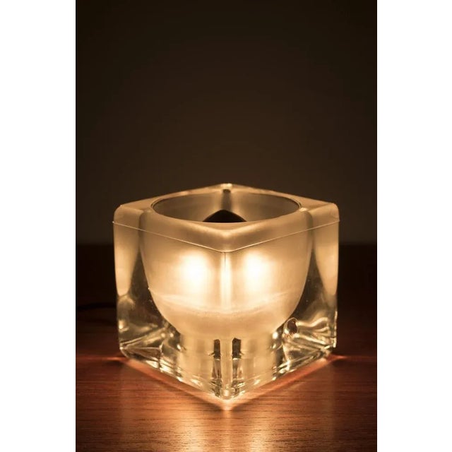 A wonderful glass table lamp by putzler with the original box. The table lamp is in good vintage condition. Measurements...