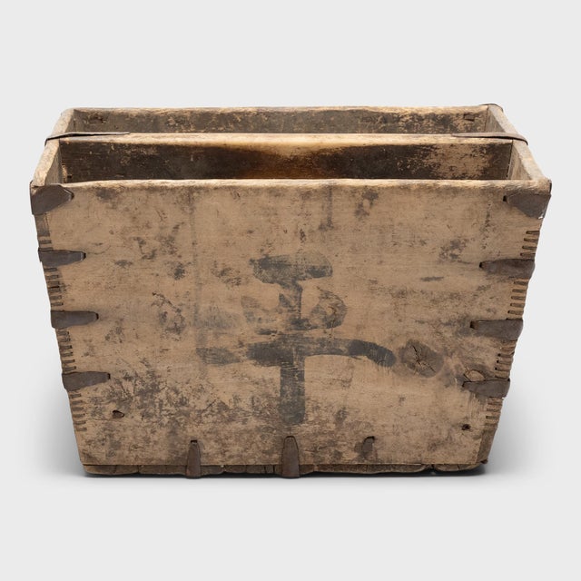 This rustic container was made over a hundred years ago to measure and hold a dou of rice, a traditional Chinese unit of...