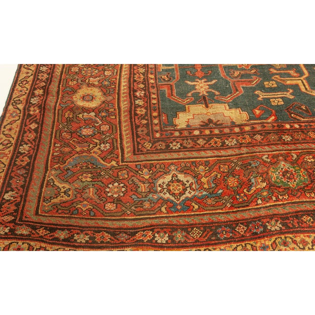 A late 19th century Persian Sultanabad antique carpet, the slate blue field with a highly geometric design of angular...