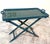Elegant vintage folding tray table, handcrafted in Italy. The piece features a lacquered wooden frame in a rich teal...