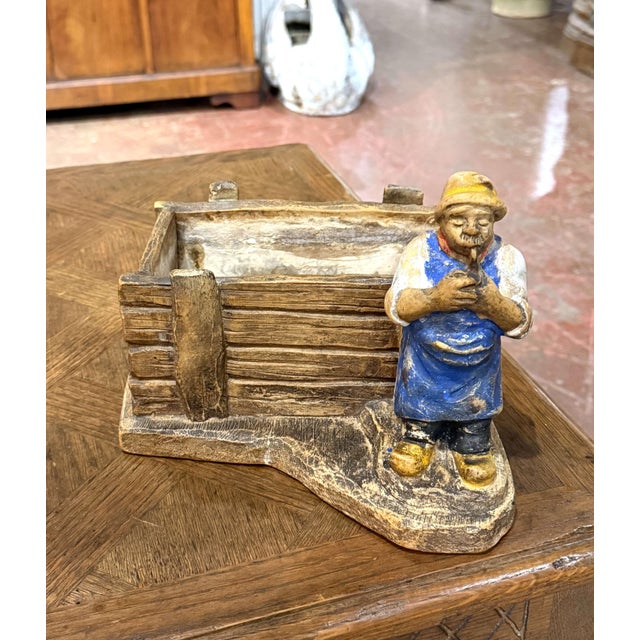 Add rustic French character to a kitchen, garden room, or conservatory with this charming antique figural cachepot....