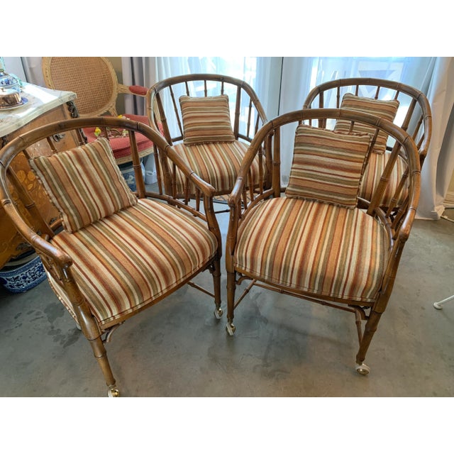 Fabulous set of four vintage 1960's faux bamboo barrel back arm chairs. Perfect for the gaming table or breakfast nook....