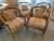 Fabulous set of four vintage 1960's faux bamboo barrel back arm chairs. Perfect for the gaming table or breakfast nook....