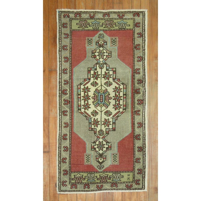 Pair of Vintage hand-knotted vintage Turkish Rugs from the middle of the 20th Century.