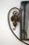 Wrought iron mirror with hammered frame. Decorated with a superb rose, leaves and scrolls. Channel present. Restored...