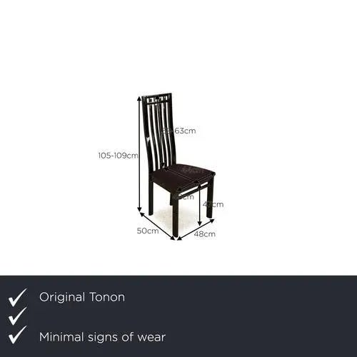 The Tonon chair set is made of black wood and impresses with a timeless design. The set consists of different chairs. I...
