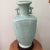 This antique Big & Heavy Celadon Glazed Crackle Porcelain Double Ear Vase is a stunning piece of Chinese pottery with a...