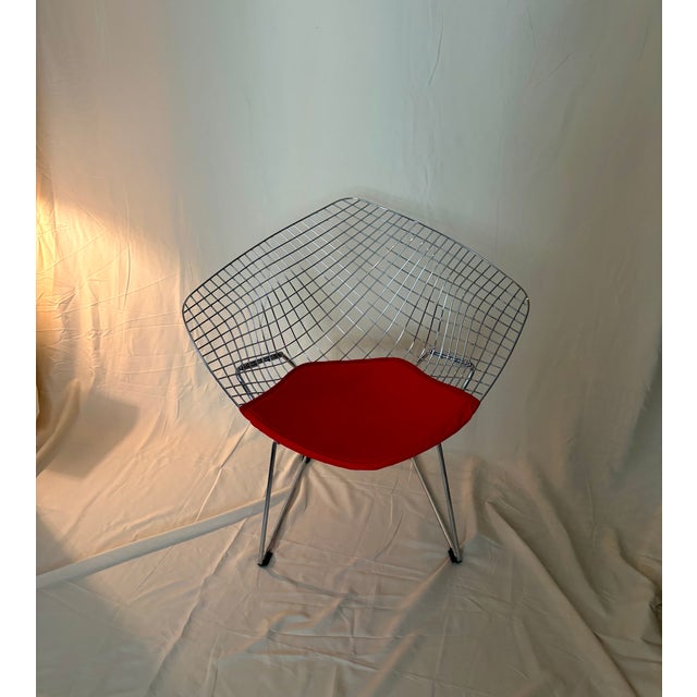 Vintage Harry Bertoia for Knoll Diamond Lounge Chair with red fabric seat pad. Apparently unmarked. Polished chrome with...