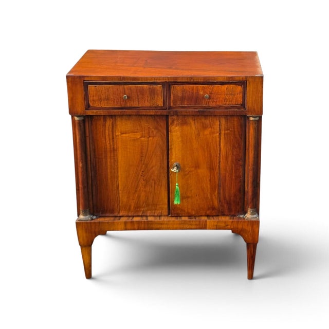 A handsome example of early American craftsmanship, this American Classical cabinet, dating to circa 1840, embodies the...
