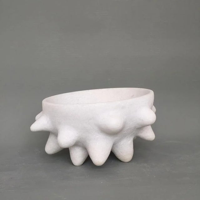 Hand carved marble sculpture by tom von kaenel dimensions: d34 x w28 x h18 cm materials: marble this piece is attributed...