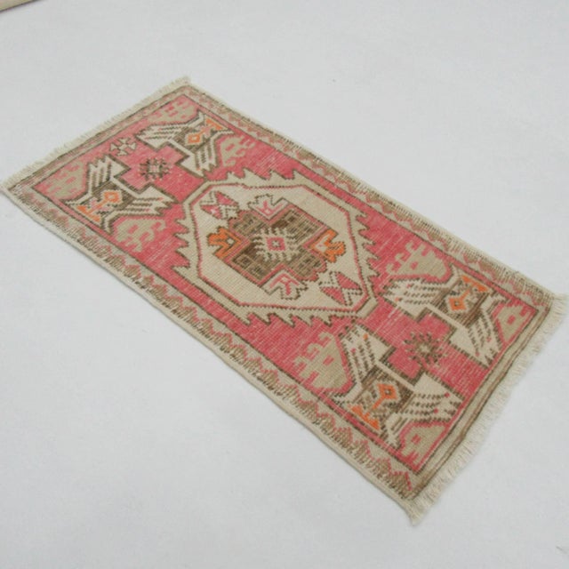 Vintage handknotted decorative mini rug from Konya region of Turkey. Approximately 50-60 years old. In very good condition.