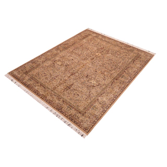 Designed with mesmerizing intricacy and gorgeous color palette, this hand-knotted masterpiece demonstrates the beauty and...
