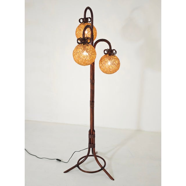 Gorgeous vintage Italian bamboo and rattan floor lamp, dating back to the 1960s, Italian Midcentury Modern production....
