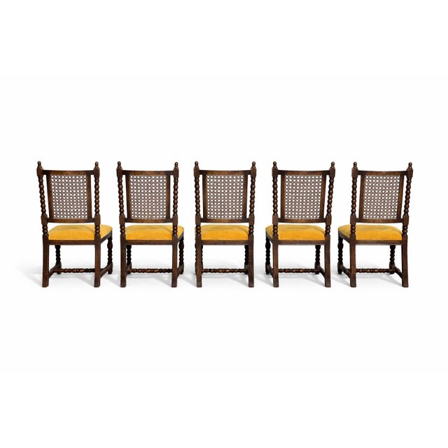 This exceptional set of five antique, one-of-a-kind barley twist chairs, crafted in the Baroque Revival style circa the...