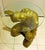 This Vintage Gilded Carved Wood Asian Figural Side Table with Glass Top is a unique and exquisite piece of furniture from...