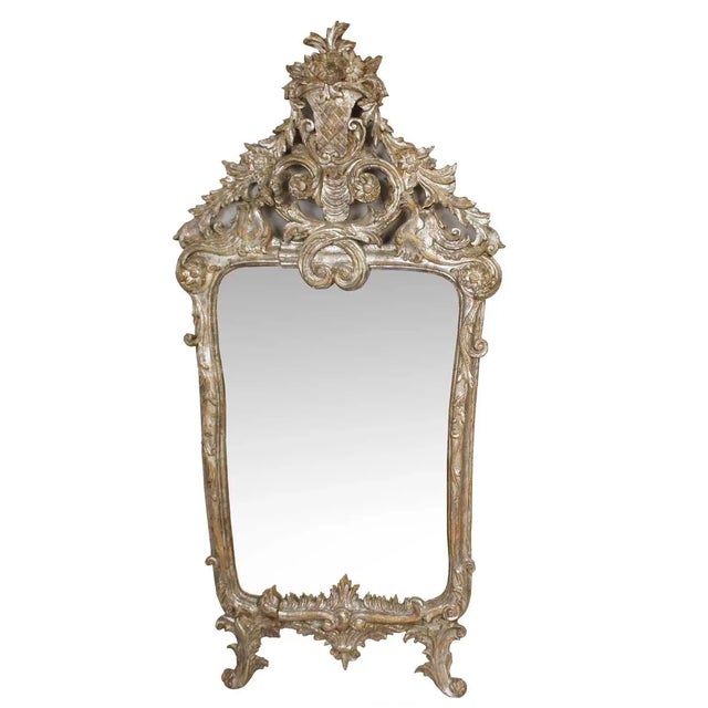 DETAILS Each antique mirror has a cartouche shaped plate has a tall, pierced, cresting centered with interlaced S-scrolls...