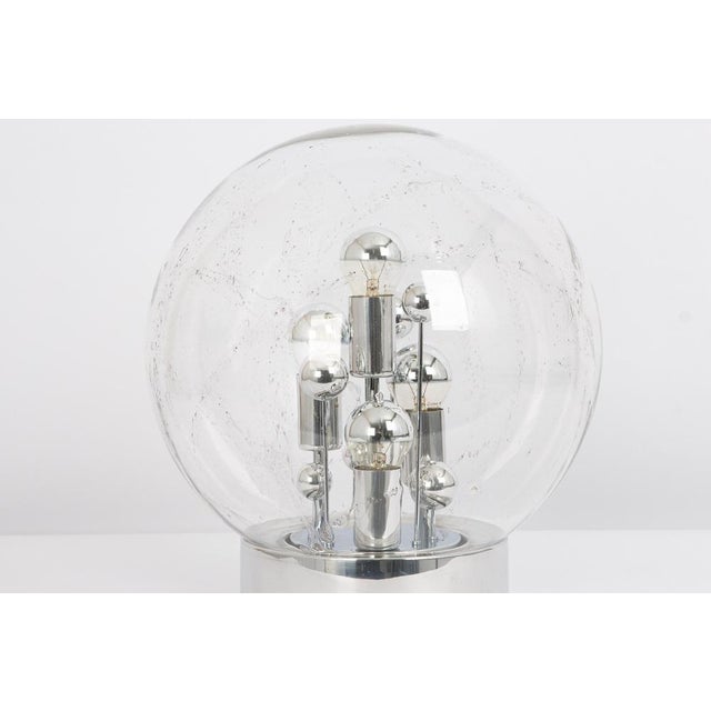 A spectacular vintage table lamp, made by doria and it dates from the 1970’s. This is beautifully made with a large glass...