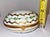 Elegant vintage Limoges porcelain trinket box crafted in France with a domed oval form, hand-painted green botanical...