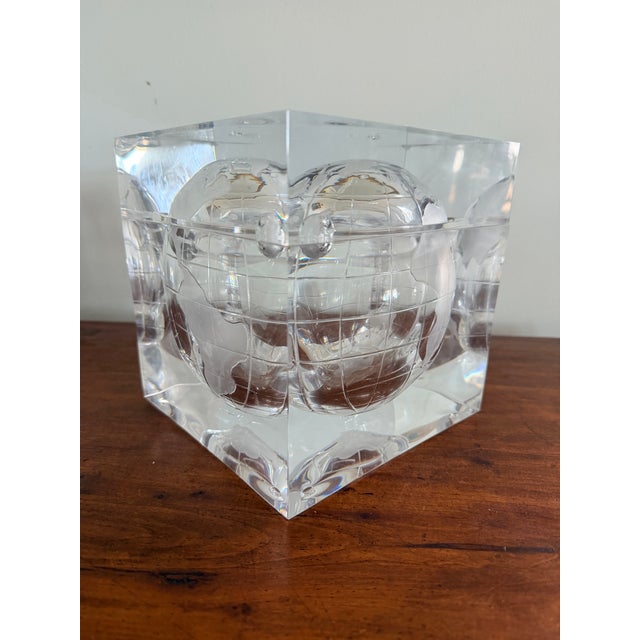 Lucite cube ice bucket depicting the world captured in a cube of acrylic that resembles an ice cube. Frosted world map of...