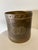 Mid Century Brass Cachepot with embossed decorative borders on top and bottom.