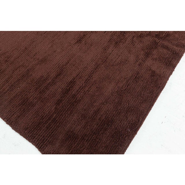 Vintage Moroccan Brown Rug Size: 7'0" × 7'10" (213 × 238 cm) This exquisite vintage Moroccan rug features a rich, deep...