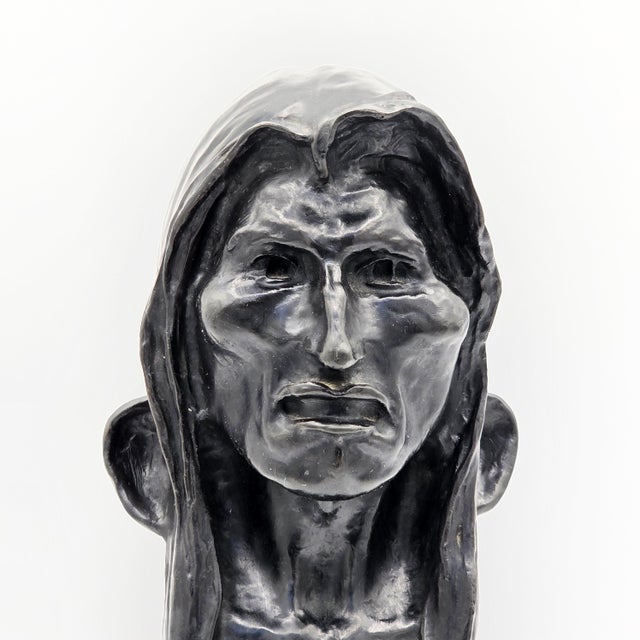 Vintage reproduction bust sculpture after Frederic Remington’s 1908 work historically titled The Savage. This substantial...