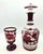 Offered is a mid 20th Century Czech or Bohemian decanter with stopper and a matching footed goblet or chalice. The ruby-...