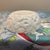 This elegant vintage white ceramic bowl features the "Imperial Fancies" pattern by Spode, crafted in England. The exterior...