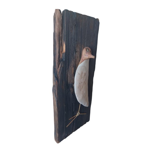 Vintage mid century small terracotta bird sculpture on reclaimed board. Unsigned