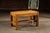 Solid oak coffee table executed in the Mission / Arts & Crafts tradition, defined by rectilinear proportions, exposed...