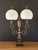 An elegant 1950s Italian table lamp featuring a beautifully aged brass frame, carved wood base, and two original opaline...
